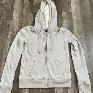 Sweater with furry hood